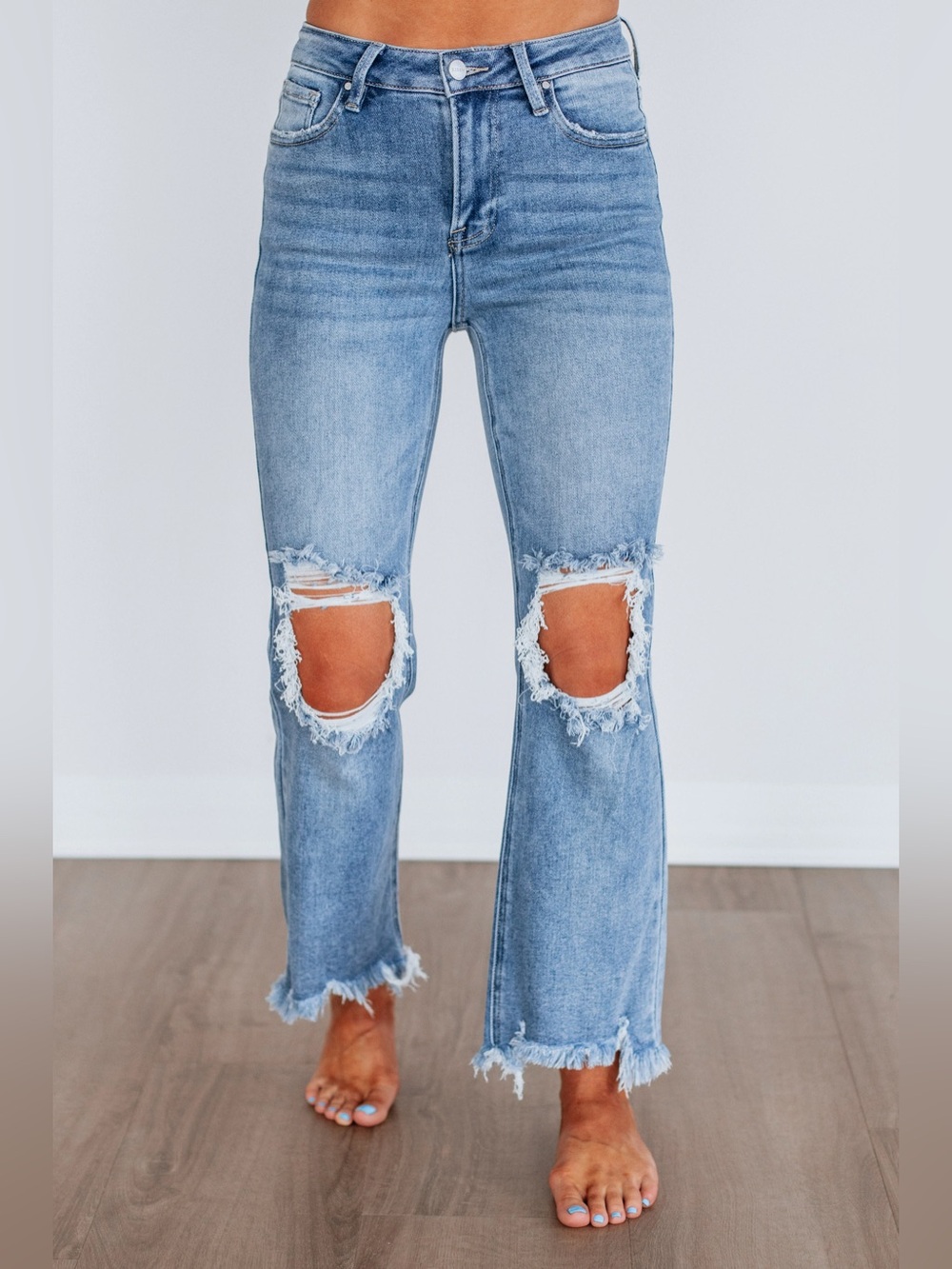 High-Rise Light Blue Distressed Flare Jeans